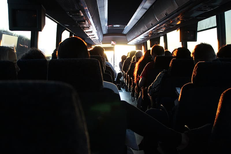 Group of people riding in bus